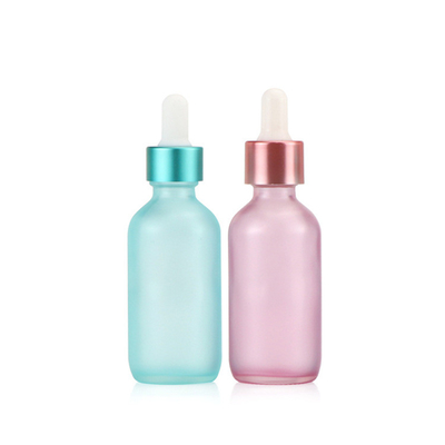 Botella de aceite esencial vacía del dropper de cristal rosado azul semi transparente 30ml