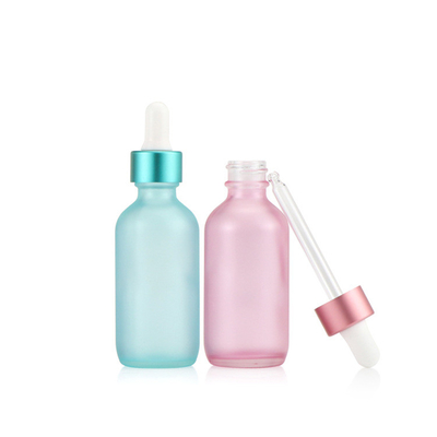 Botella de aceite esencial vacía del dropper de cristal rosado azul semi transparente 30ml