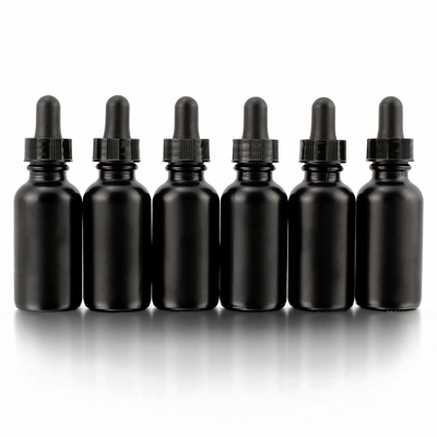 La botella de cristal negra del ojo cosmético 30ml con el dropper no se derrama