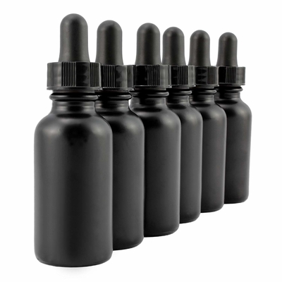 La botella de cristal negra del ojo cosmético 30ml con el dropper no se derrama